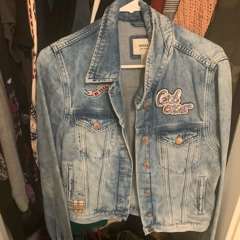 Light wash jean jacket with cute patches!
